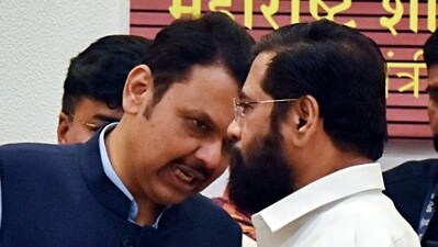 Eknath Shinde in a conversation with CM Devendra Fadnavis during a press conference in Mumbai. (ANI Photo) Eknath Shinde in a conversation with CM Devendra Fadnavis during a press conference in Mumbai. (ANI Photo)