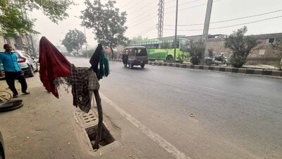 An uncovered road gully near Cheema Chowk in Ludhiana on Wednesday. (HT photo) An uncovered road gully near Cheema Chowk in Ludhiana on Wednesday. (HT photo)
