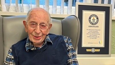 John Alfred Tinniswood poses for a photo on April 4, 2024. The world’s oldest man has died in England at age 112. The family of John Alfred Tinniswood said he died Monday, Nov. 25, 2024 at a care home outside Liverpool, where he was born in 1912. (AP)