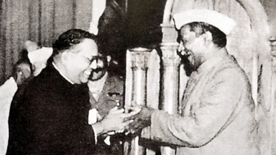 Dr BR Ambedkar presents the final draft of the Constitution to Dr Rajendra Prasad, the president of the Constituent Assembly, in 1949. (HT Archive) Dr BR Ambedkar presents the final draft of the Constitution to Dr Rajendra Prasad, the president of the Constituent Assembly, in 1949. (HT Archive)