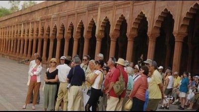Foreign visitors at a tourist destination in U.P. recently (HT File Photo) Foreign visitors at a tourist destination in U.P. recently (HT File Photo)