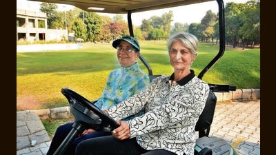 Gurbirinder Johal (in blue), 88, the oldest golfer at the championship, with Rima Dhillon, 62, lady captain at Chandigarh Golf Club. (Sant Arora/HT) Gurbirinder Johal (in blue), 88, the oldest golfer at the championship, with Rima Dhillon, 62, lady captain at Chandigarh Golf Club. (Sant Arora/HT)
