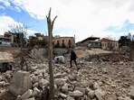 A man walks near the site of the historic 'Al-Manshiya' building damaged in the aftermath of Israeli strikes, near the Roman ruins of Baalbek, in the eastern city of Baalbek, Lebanon. A man walks near the site of the historic 'Al-Manshiya' building damaged in the aftermath of Israeli strikes, near the Roman ruins of Baalbek, in the eastern city of Baalbek, Lebanon.