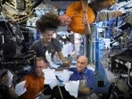 NASA astronauts Sunita Williams, Nick Hague, Barry Wilmore, and Donald Pettit unbox Thanksgiving meals, from the International Space Station (ISS), in this screen grab taken from a handout video, released on November 26, 2024. 