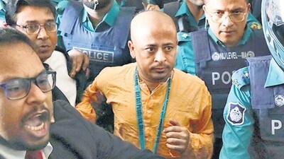 Chinmoy Krishna Das, a Hindu leader associated with the International Society for Krishna Consciousness (ISKCON), who faces several charges, is escorted by the police at the Chattogram Metropolitan Magistrate Court. (Reuters file photo) Chinmoy Krishna Das, a Hindu leader associated with the International Society for Krishna Consciousness (ISKCON), who faces several charges, is escorted by the police at the Chattogram Metropolitan Magistrate Court. (Reuters file photo)