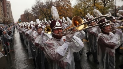 The University of Massachusetts Minutemen marching band plays as it makes its way down Central Park West while participating in the Macy's Thanksgiving Day Parade. (AP) The University of Massachusetts Minutemen marching band plays as it makes its way down Central Park West while participating in the Macy's Thanksgiving Day Parade. (AP)