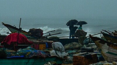 Chennai weather live updates: Fishing boats anchored amidst the forecast of heavy rains at Marina beach, along the coast of the Bay of Bengal, in Chennai, Tuesday. (PTI) Chennai weather live updates: Fishing boats anchored amidst the forecast of heavy rains at Marina beach, along the coast of the Bay of Bengal, in Chennai, Tuesday. (PTI)