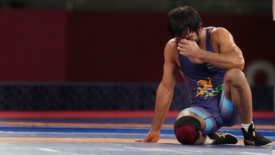India's wrestler Bajrang Punia reacts after a wrestling match (PTI) India's wrestler Bajrang Punia reacts after a wrestling match (PTI)