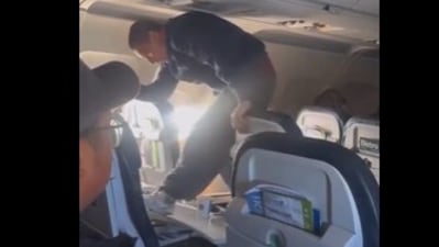 Passenger attacked seat mid-flight on United Airlines, causing chaos before being restrained. (Reddit) Passenger attacked seat mid-flight on United Airlines, causing chaos before being restrained. (Reddit)