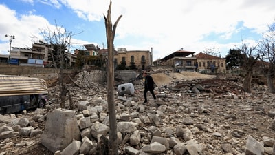 A man walks near the site of the historic 'Al-Manshiya' building damaged in the aftermath of Israeli strikes, near the Roman ruins of Baalbek, in the eastern city of Baalbek, Lebanon. (Reuters) A man walks near the site of the historic 'Al-Manshiya' building damaged in the aftermath of Israeli strikes, near the Roman ruins of Baalbek, in the eastern city of Baalbek, Lebanon. (Reuters)