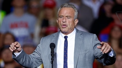 Former Republican presidential candidate Robert F. Kennedy Jr. gestures as he speaks ahead of Former US President and Republican presidential candidate Donald Trump at a campaign rally at the Fiserv Forum in Milwaukee, Wisconsin, November 1, 2024. (Photo by KAMIL KRZACZYNSKI / AFP) (AFP) Former Republican presidential candidate Robert F. Kennedy Jr. gestures as he speaks ahead of Former US President and Republican presidential candidate Donald Trump at a campaign rally at the Fiserv Forum in Milwaukee, Wisconsin, November 1, 2024. (Photo by KAMIL KRZACZYNSKI / AFP) (AFP)