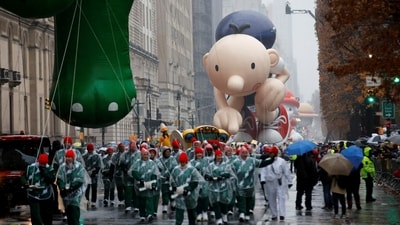 Diary of a Wimpy Kid balloon flies during the 98th Macy's Thanksgiving Day Parade in New York City. The parade began at 8.30 a.m. on Manhattan’s Upper West Side and ends 2.5 miles (4 kilometers) away around noon at Macy’s Herald Square flagship store on 34th Street. (REUTERS)