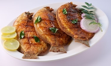 Karimeen Pollichathu is a traditional Keralan delicacy, particularly popular in the Kuttanadan region of Alleppey Karimeen Pollichathu is a traditional Keralan delicacy, particularly popular in the Kuttanadan region of Alleppey