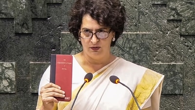 Congress leader Priyanka Gandhi Vadra takes oath as a Member of Parliament in the Lok Sabha during the Winter session of Parliament, in New Delhi, Thursday, Nov. 28, 2024. (PTI) Congress leader Priyanka Gandhi Vadra takes oath as a Member of Parliament in the Lok Sabha during the Winter session of Parliament, in New Delhi, Thursday, Nov. 28, 2024. (PTI)