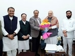 Maharashtra's caretaker CM and Shiv Sena chief Eknath Shinde, BJP leader Devendra Fadnavis and NCP chief Ajit Pawar meet Union Home Minister Amit Shah, in New Delhi on Thursday.