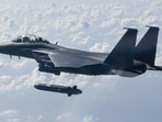 The military of South Korea reported Friday that it had scrambled fighter jets after six Russian and five Chinese military aircraft passed over its air defence zone, which is larger than the nation's airspace. The military of South Korea reported Friday that it had scrambled fighter jets after six Russian and five Chinese military aircraft passed over its air defence zone, which is larger than the nation's airspace.