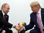 FILE - In this June 28, 2019, file photo, Donald Trump shakes hands with Russian President Vladimir Putin during a bilateral meeting on the sidelines of the G-20 summit in Osaka, Japan. FILE - In this June 28, 2019, file photo, Donald Trump shakes hands with Russian President Vladimir Putin during a bilateral meeting on the sidelines of the G-20 summit in Osaka, Japan.