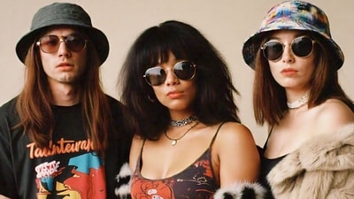 90s fashion is back! Revamp your style with graphic tees, bucket hats, faux fur, and chokers for a perfect mix of nostalgia and modern flair. (AI generated) 90s fashion is back! Revamp your style with graphic tees, bucket hats, faux fur, and chokers for a perfect mix of nostalgia and modern flair. (AI generated)