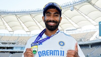 Jasprit Bumrah poses for a picture with the Player of the Match medal. (BCCI- X) Jasprit Bumrah poses for a picture with the Player of the Match medal. (BCCI- X)