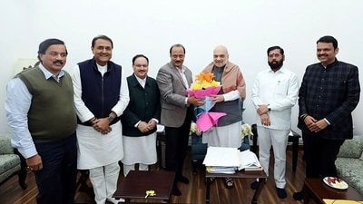 Maharashtra's caretaker CM and Shiv Sena chief Eknath Shinde, BJP leader Devendra Fadnavis and NCP chief Ajit Pawar meet Union Home Minister Amit Shah, in New Delhi on Thursday. (ANI) Maharashtra's caretaker CM and Shiv Sena chief Eknath Shinde, BJP leader Devendra Fadnavis and NCP chief Ajit Pawar meet Union Home Minister Amit Shah, in New Delhi on Thursday. (ANI)