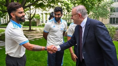 Australian Prime Minister Anthony Albanese, right, shakes hands with Indian cricketer Virat Kohli during a reception at Parliament House in Canberra. (AP) Australian Prime Minister Anthony Albanese, right, shakes hands with Indian cricketer Virat Kohli during a reception at Parliament House in Canberra. (AP)