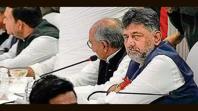 Karnataka deputy CM DK Shivakumar at the Congress working committee meeting in New Delhi on Friday. (PTI) Karnataka deputy CM DK Shivakumar at the Congress working committee meeting in New Delhi on Friday. (PTI)