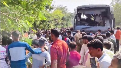 People gather at the site after a Maharashtra State Road Transport Corporation bus overturned in Gondia district of Maharashtra on Friday. (PTI) People gather at the site after a Maharashtra State Road Transport Corporation bus overturned in Gondia district of Maharashtra on Friday. (PTI)