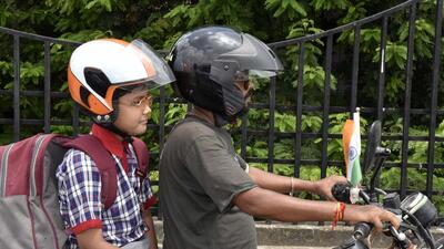 Pune police have decided to postpone the implementation of mandatory helmet enforcement for two-wheeler pillion riders. ((PIC FOR REPRESENTATION)) Pune police have decided to postpone the implementation of mandatory helmet enforcement for two-wheeler pillion riders. ((PIC FOR REPRESENTATION))