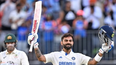 India's Virat Kohli celebrates reaching his century. (AFP)