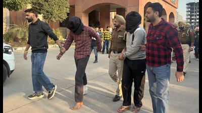 The accused in police custody in Mohali on Friday. (HT Photo) The accused in police custody in Mohali on Friday. (HT Photo)