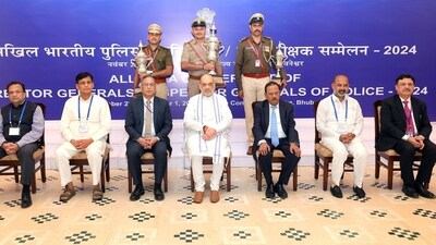 Union Minister for Home Affairs and Cooperation Amit Shah in a group picture at the inauguration of 59th DGP/IGP Conference, in Bhubaneswar on Friday. National Security Advisor (NSA) Ajit Doval, MoS Bandi Sanjay Kumar and others also present. (ANI PHOTO) Union Minister for Home Affairs and Cooperation Amit Shah in a group picture at the inauguration of 59th DGP/IGP Conference, in Bhubaneswar on Friday. National Security Advisor (NSA) Ajit Doval, MoS Bandi Sanjay Kumar and others also present. (ANI PHOTO)