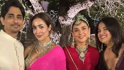 Malaika Arora added a tiny red bindi to finish off her beautiful destination wedding look. Malaika Arora added a tiny red bindi to finish off her beautiful destination wedding look.