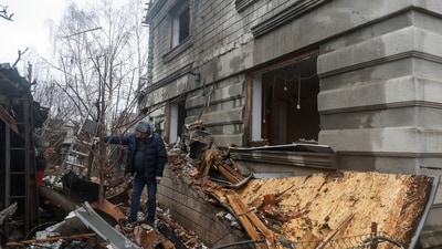 A resident stands next to his house damaged by a Russian drone strike outside Odesa, Ukraine. (REUTERS)