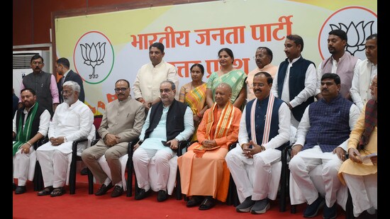 Chief Minister Yogi Adityanath and others at a felicitation of newly elected BJP MLA’S in UP By-election at BJP state headquarter in Lucknow on Friday (HT Photo)