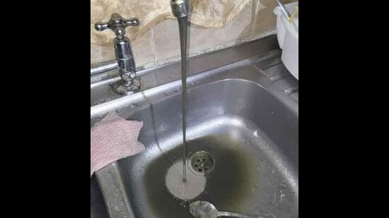 Dirty water supply in a house in Bhagwan Nagar Colony.