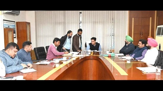 MC officials during a review meeting regarding the Buddha Nullah rejuvenation project in Ludhiana on Friday. (HT Photo)