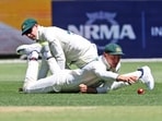 Australia's Marnus Labuschagne, right, reaches out for the ball as he and teammate Steve Smith attempt to field the ball during the Perth Test. Australia's Marnus Labuschagne, right, reaches out for the ball as he and teammate Steve Smith attempt to field the ball during the Perth Test.