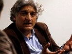  Matiullah Jan, a journalist and columnist, gestures during an interview with Reuters at his office in Islamabad, Pakistan 