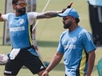 Virat Kohli and Rohit Sharma during a net session.