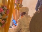 Groom checked trading graph during wedding ceremony.
