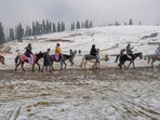 Gulmarg: Tourists take a pony ride after the season's first snowfall, at Kongdoori area of Gulmarg, in Baramulla district Gulmarg: Tourists take a pony ride after the season's first snowfall, at Kongdoori area of Gulmarg, in Baramulla district