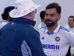 Australia PM Anthony Albanese (L) talks to Virat Kohli ahead of Day 1 of India's pink-ball warm-up match