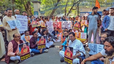 Vishva Hindu Parishad (VHP) supporters protest against the arrest of ISKCON monk Chinmay Prabhu in Bangladesh, in Birbhum on Friday. (ANI) Vishva Hindu Parishad (VHP) supporters protest against the arrest of ISKCON monk Chinmay Prabhu in Bangladesh, in Birbhum on Friday. (ANI)