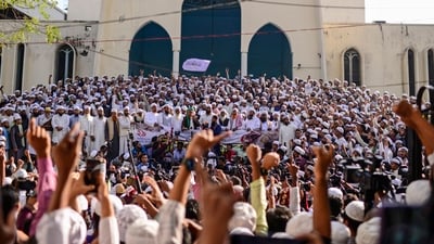 Hefazat-e-Islam supporters stage a protest after Friday prayers at Baitul Mukarram National Mosque, demanding an immediate ban on International Society for Krishna Consciousness (ISKCON) in Dhaka, Bangladesh, on November 29. (AP) Hefazat-e-Islam supporters stage a protest after Friday prayers at Baitul Mukarram National Mosque, demanding an immediate ban on International Society for Krishna Consciousness (ISKCON) in Dhaka, Bangladesh, on November 29. (AP)