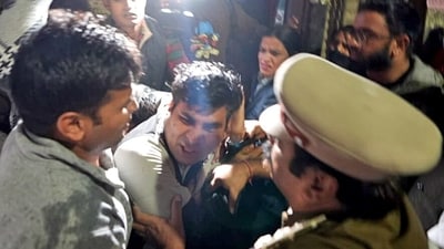 Delhi Police detain the person who tried to throw a liquid on former Delhi CM and Aam Aadmi Party (AAP) national convener Arvind Kejriwal during his padyatra at Greater Kailash in New Delhi on Saturday. (Atishi/X) Delhi Police detain the person who tried to throw a liquid on former Delhi CM and Aam Aadmi Party (AAP) national convener Arvind Kejriwal during his padyatra at Greater Kailash in New Delhi on Saturday. (Atishi/X)
