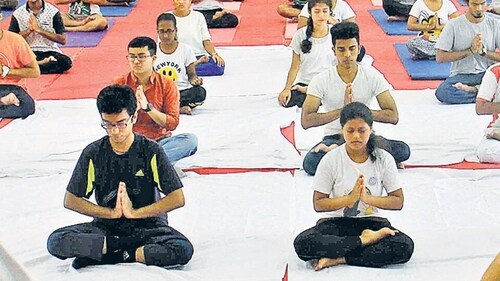 Students perform Yoga at R.D. National College, Bandra in Mumbai, India (Photo by Pramod Thakur/ Hindustan Times) (Hindustan Times) Students perform Yoga at R.D. National College, Bandra in Mumbai, India (Photo by Pramod Thakur/ Hindustan Times) (Hindustan Times)