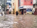 Cyclone Fengal impact: A man walks on a waterlogged road following heavy rainfall in Chennai. (ANI Photo) Cyclone Fengal impact: A man walks on a waterlogged road following heavy rainfall in Chennai. (ANI Photo)