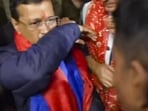 Former Delhi chief minister and AAP chief Arvind Kejriwal reacts after a man allegedly splashed liquid on him in New Delhi on Saturday. Former Delhi chief minister and AAP chief Arvind Kejriwal reacts after a man allegedly splashed liquid on him in New Delhi on Saturday.