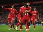 Liverpool's Cody Gakpo celebrates scoring their first goal with Mohamed Salah.