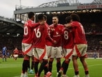 Manchester United's Joshua Zirkzee celebrates scoring their fourth goal with Bruno Fernandes, Diogo Dalot and teammates Action Images via Reuters/Lee Smith 